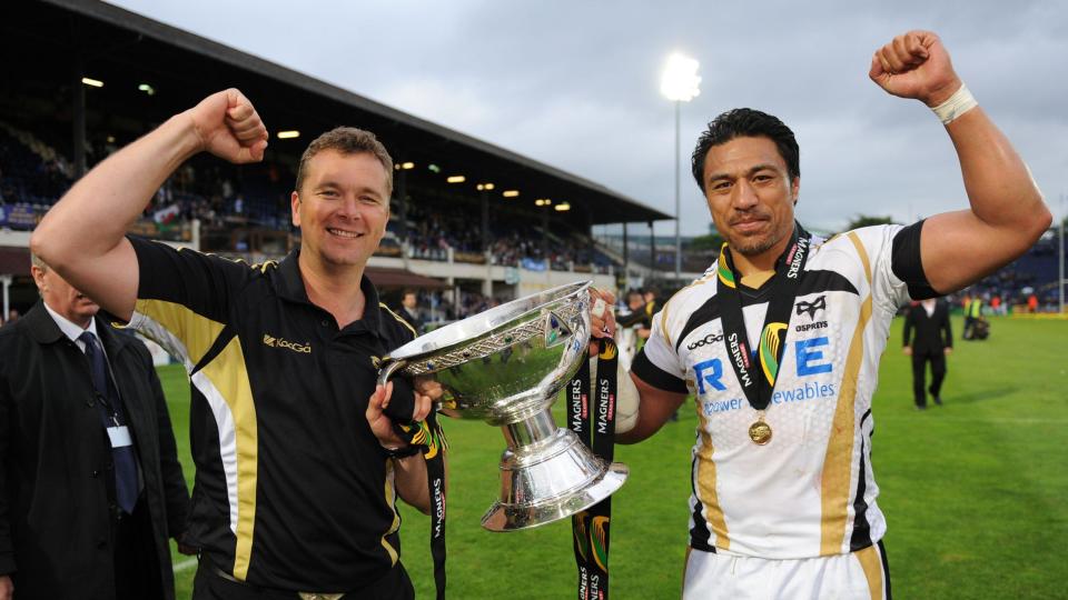 Then Ospreys coach Sean Holley and Filo Tiatia holding the Magners League trophy in 2010