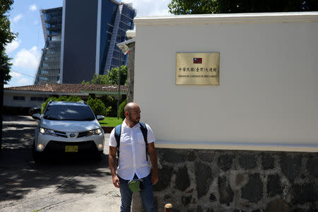 Salvadoran Roberto Romero waits to visit the Taiwan embassy a day after the Salvadoran government announced that it has broken off diplomatic relations with Taiwan, in San Salvador, El Salvador August 21, 2018. REUTERS/Jose Cabezas