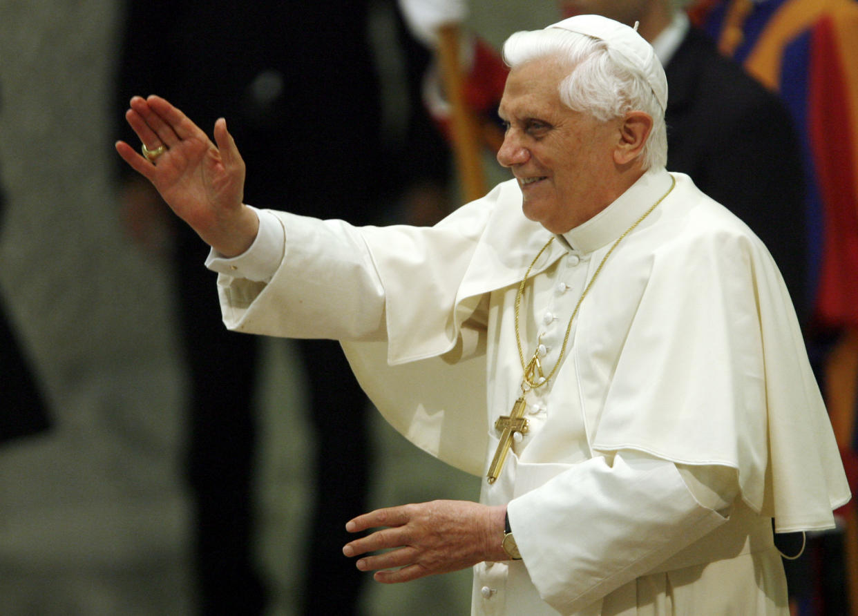 FILE - Pope Benedict XVI greets the faithful during an audience at the Vatican on June 30, 2007, as he invited all Roman Catholics in China to unite under his jurisdiction and urged Beijing to restore diplomatic ties and permit religious freedom. Pope Emeritus Benedict XVI, the German theologian who will be remembered as the first pope in 600 years to resign, has died, the Vatican announced Saturday Dec. 31, 2022. He was 95. (AP Photo/Andrew Medichini, File)