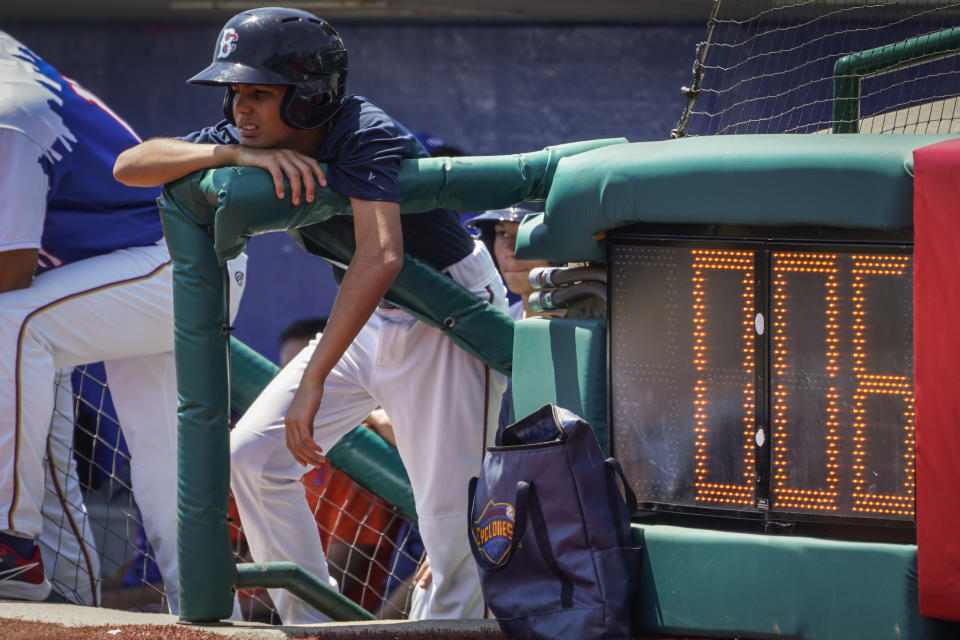 A pitch clock is deployed to restrict pitcher preparation times during a minor league baseball game between the Brooklyn Cyclones and Greensboro Grasshoppers, Wednesday, July 13, 2022, in the Coney Island neighborhood of the Brooklyn borough of New York. Major League Baseball is considering a pitch clock for next year along with shift limits, larger bases and restrictions on pickoff attempts. (AP Photo/John Minchillo)