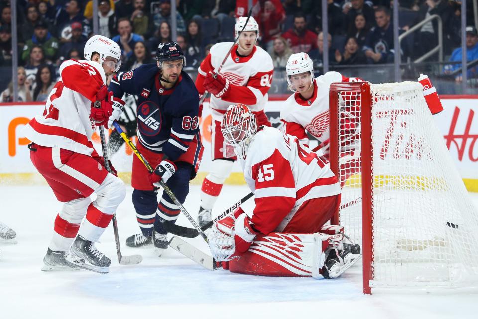 Winnipeg Jets forward Nino Niederreiter (62) scores on Detroit Red Wings goalie Magnus Hellberg (45) during the second period at Canada Life Centre in Winnipeg, Manitoba, on Friday, March 31, 2023.