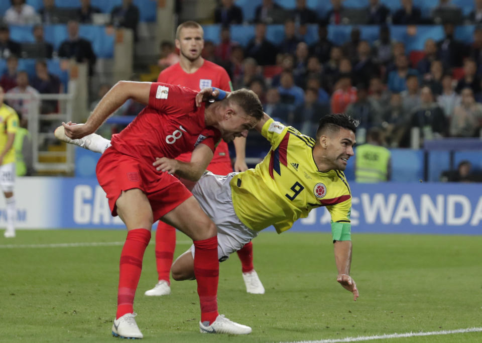 <p>Colombia’s Radamel Falcao, right, falls next to England’s Jordan Henderson during the round of 16 match between Colombia and England at the 2018 soccer World Cup in the Spartak Stadium, in Moscow, Russia, Tuesday, July 3, 2018. (AP Photo/Ricardo Mazalan) </p>