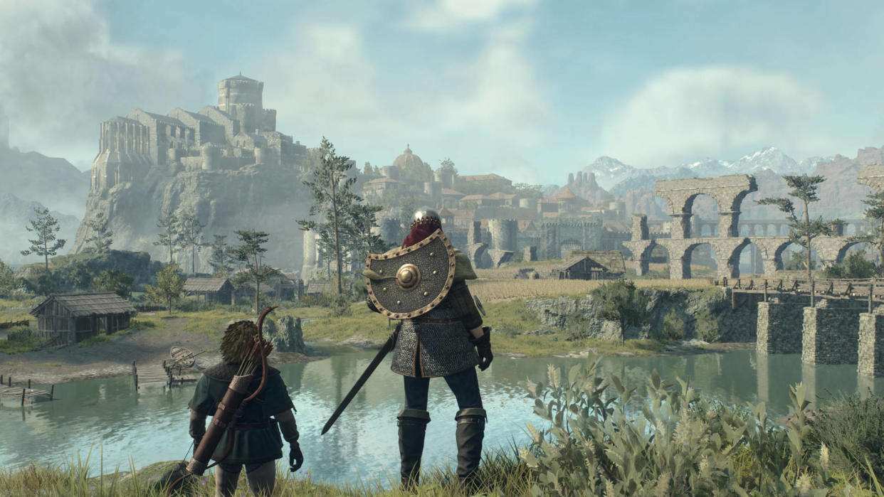  In-game screenshot from Dragon's Dogma 2, showing a fantasy landscape with a city and mountains in the distance. 