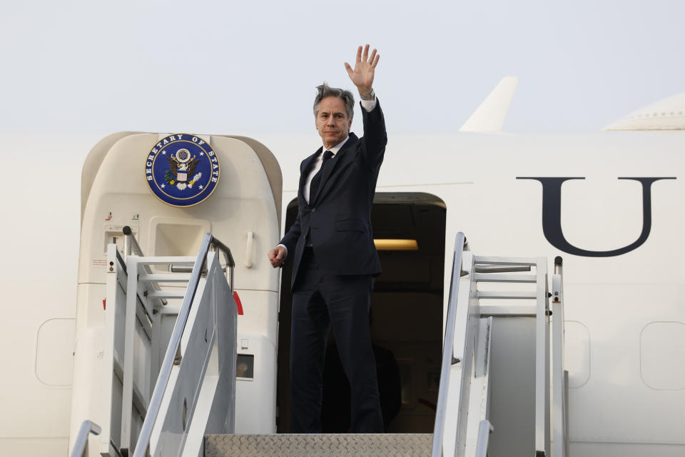 US Secretary of State Antony Blinken waves as he boards an airplane to depart for the Philippines from Osan Air Base, in Pyeongtaek, South Korea, Monday, March 18, 2024. (Evelyn Hockstein/Pool Photo via AP)