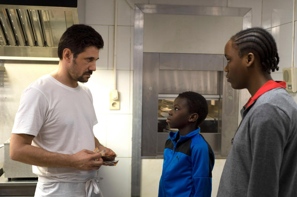 This image released by Sideshow and Janus Films shows Alban Ukaj, from left, Pablo Schils and Joely Mbundu in a scene from "Tori and Lokita." (Sideshow and Janus Films via AP)