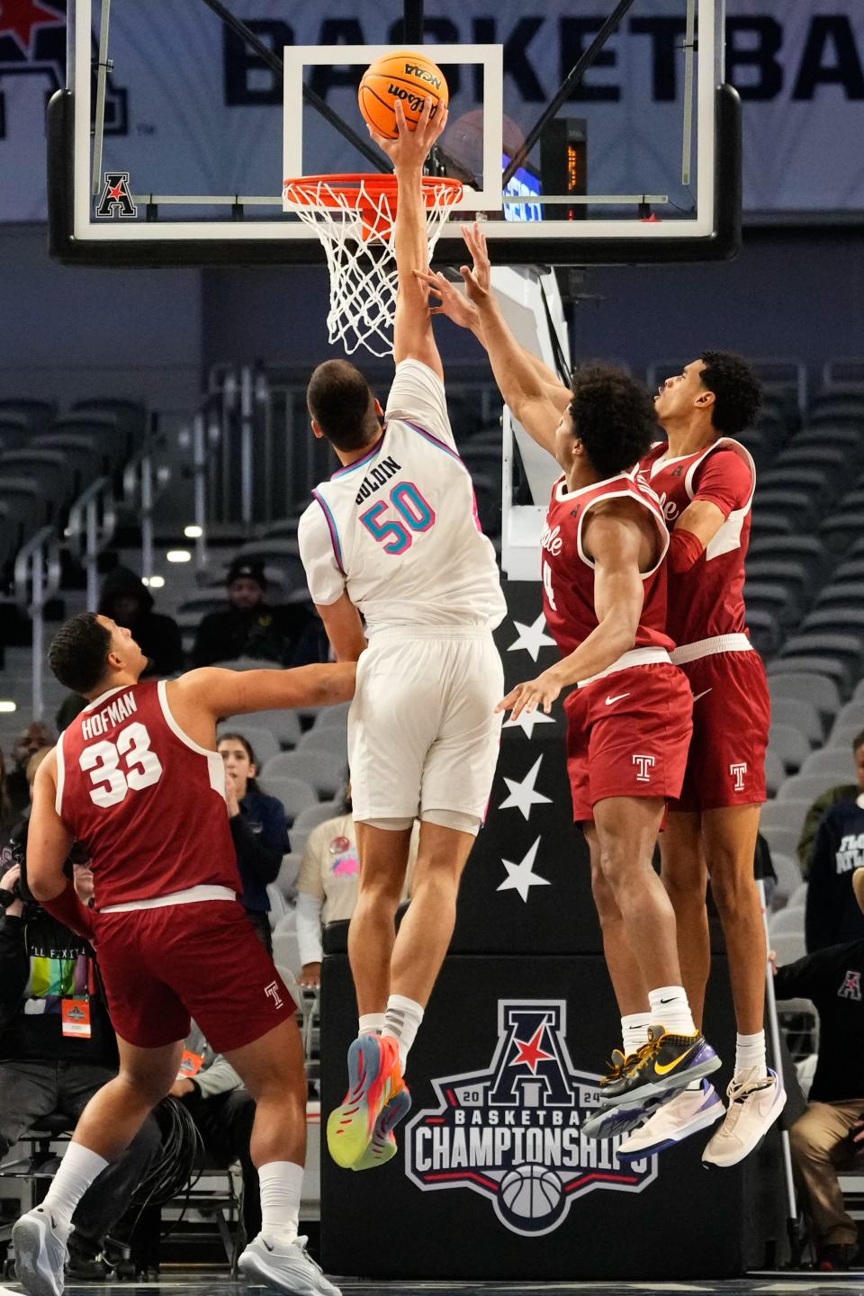 Mar 16, 2024; Fort Worth, TX, USA; Florida Atlantic Owls center Vladislav Goldin (50) dunks the ball against Temple Owls guard Jordan Riley (4) during the second half at Dickies Arena. Mandatory Credit: Chris Jones-USA TODAY Sports