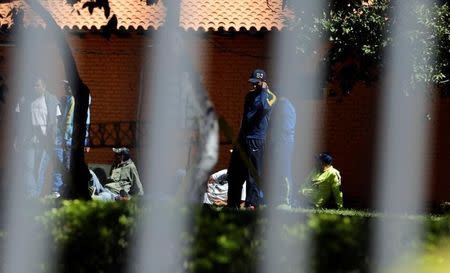 Detained fans of Boca Juniors football club are pictured at the headquarters of the Special Operations Forces of the Paraguayan Police in Asuncion, Paraguay, April 29, 2016. REUTERS/Jorge Adorno -