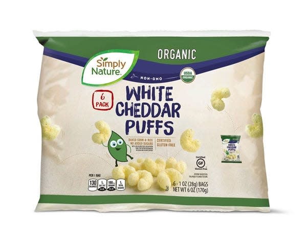 Aldi photo of white cheddar puffs in green and beige packaging
