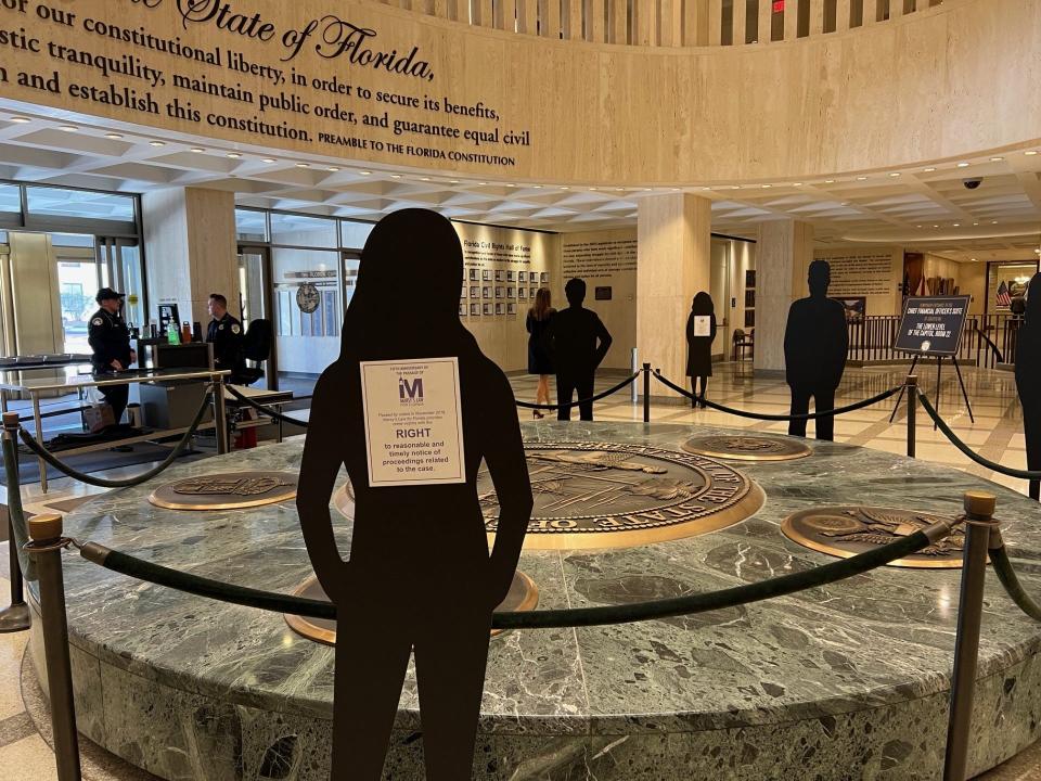Life-size cardboard silhouettes of people displaying crime victims' rights surrounded the Great Seal of the State of Florida Nov. 6, 2023 to commerate the fifth anniversary of Marsy's law passage.