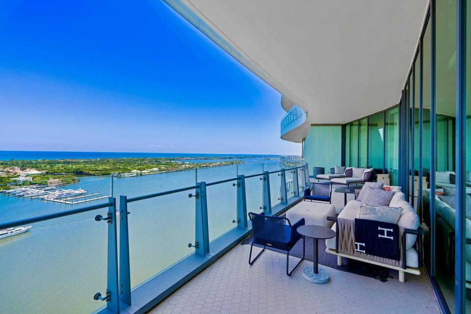 The balcony’s southeast view looks down the Intracoastal Waterway to Worth Avenue, Everglades Island, the Everglades Club Golf Course and the rest of Palm Beach.