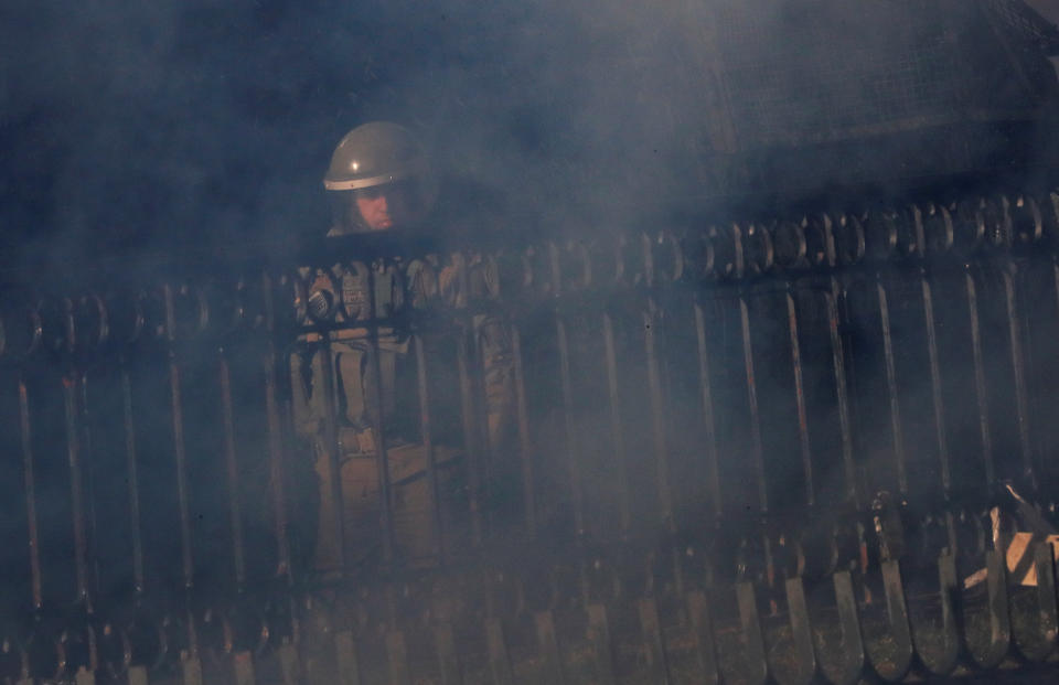 A member of the security forces is seen during an anti-government protests in Santiago, Chile on Oct. 28, 2019. (Photo: Henry Romero/Reuters)