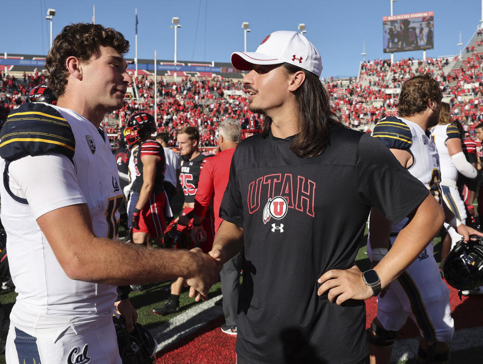 Utah quarterback Cameron Rising, right, talks with California quarterback Fernando Mendoza after an NCAA college football game in Salt Lake City Saturday, Oct. 14, 2023. (Jeffrey D. Allred/The Deseret News via AP)