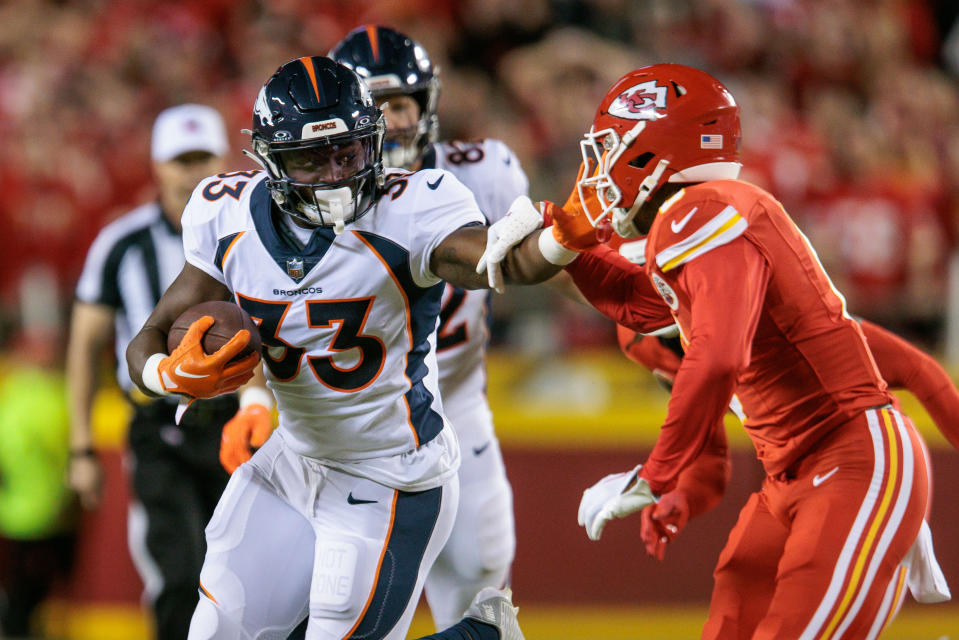 Oct 12, 2023; Kansas City, Missouri, USA; Denver Broncos running back <a class="link " href="https://sports.yahoo.com/nfl/players/33423" data-i13n="sec:content-canvas;subsec:anchor_text;elm:context_link" data-ylk="slk:Javonte Williams;sec:content-canvas;subsec:anchor_text;elm:context_link;itc:0">Javonte Williams</a> (33) runs the ball during the first quarter against the <a class="link " href="https://sports.yahoo.com/nfl/teams/kansas-city/" data-i13n="sec:content-canvas;subsec:anchor_text;elm:context_link" data-ylk="slk:Kansas City Chiefs;sec:content-canvas;subsec:anchor_text;elm:context_link;itc:0">Kansas City Chiefs</a> at GEHA Field at Arrowhead Stadium. Mandatory Credit: William Purnell-USA TODAY Sports