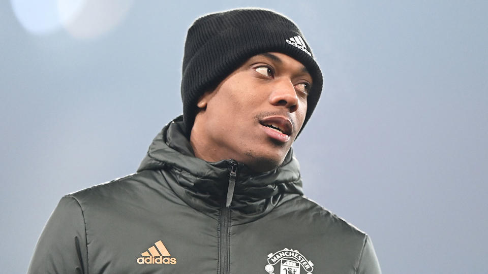 Pictured here, Anthony Martial looks on before a match for Manchester United.