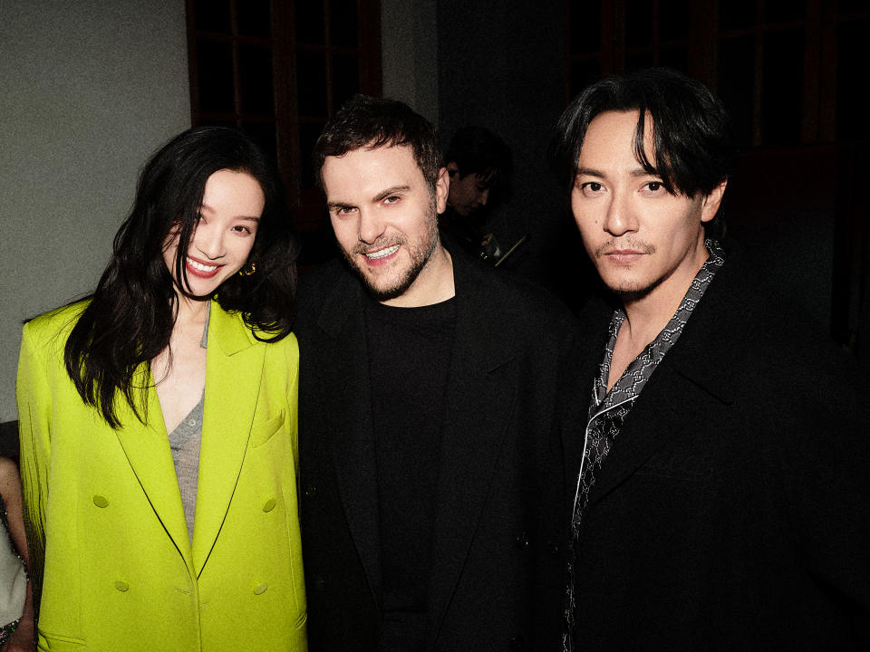 Gucci global brand ambassador Ni Ni and Chang Chen with Sabato De Sarno. 