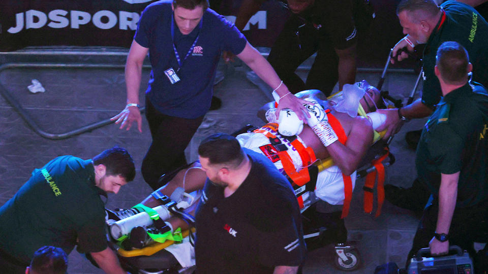 Paramedics and medical staff, pictured here stretchering Lenin Castillo out of the arena.