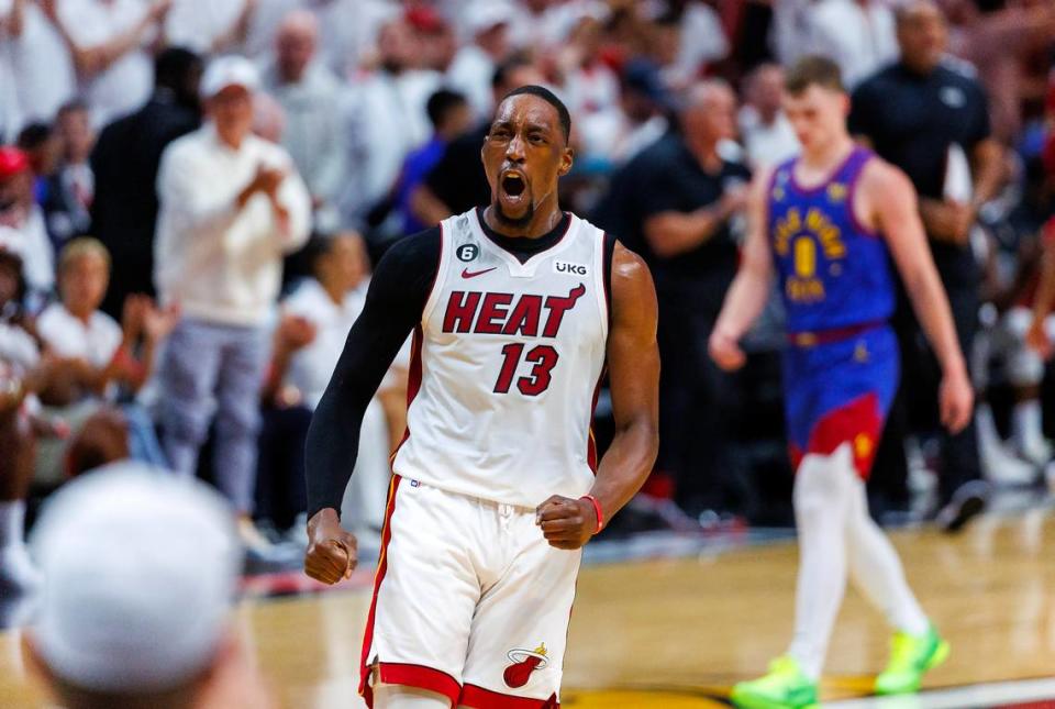 Miami Heat center Bam Adebayo (13) reacts after a play during the first half of Game 3 of the NBA Finals against the Denver Nuggets at the Kaseya Center on Wednesday, June 7, 2023, in Miami, Florida.