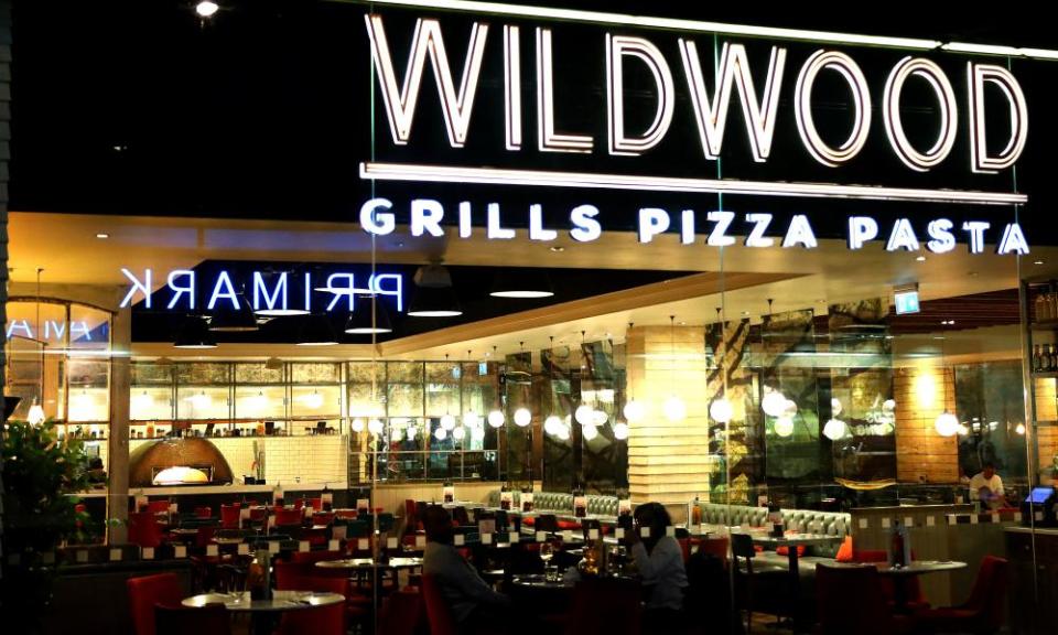 A couple enjoy a quiet dinner at Wildwood restaurant