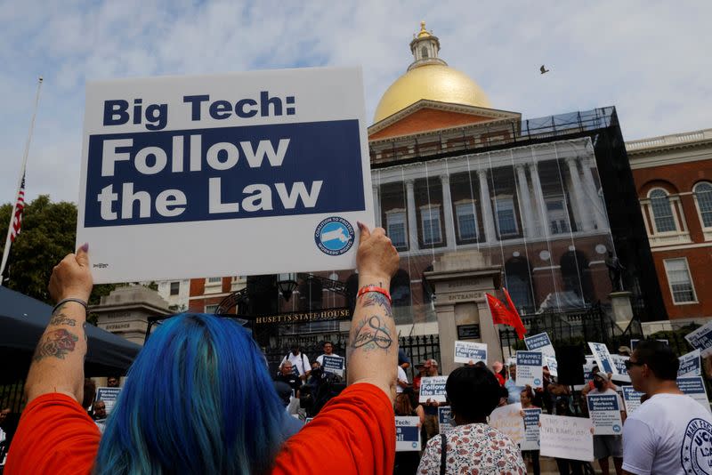 FILE PHOTO: Demonstration against “gig economy” companies in Boston