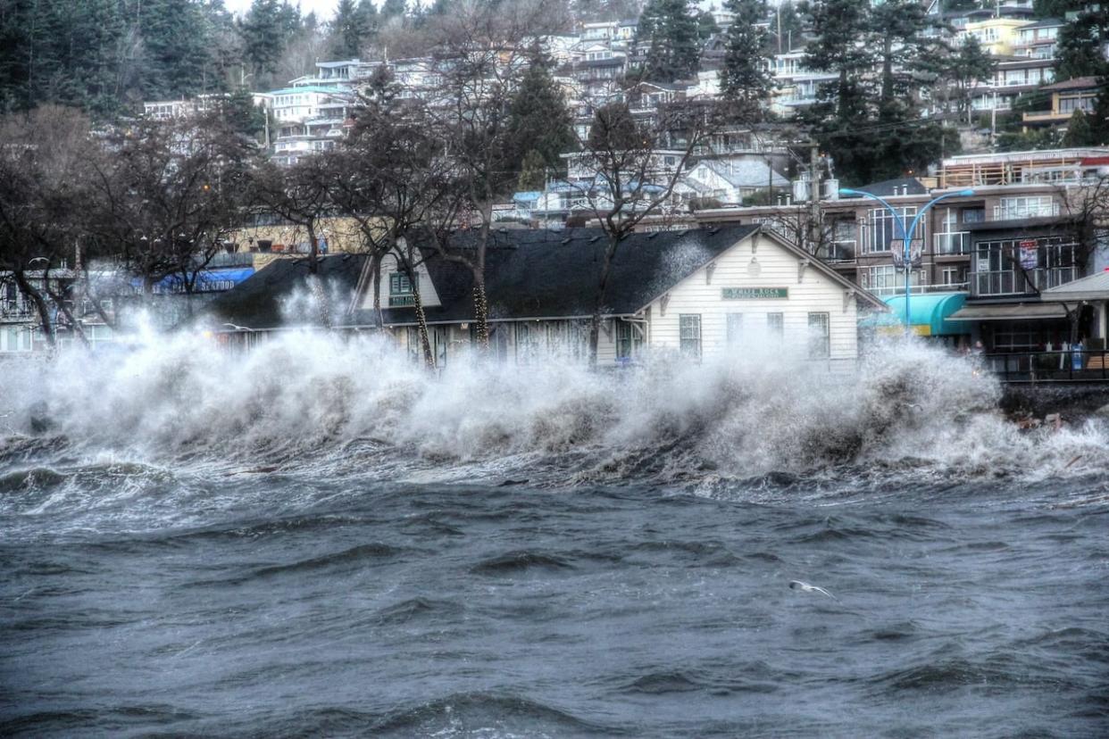 Waves push up on the shoreline in White Rock, B.C., during a storm in March 2016. New data from Climate Central, a Princeton, New Jersey-based, non-profit group, reveals nearly all of Richmond, Delta and large chunks of Surrey will lie below annual flood levels by 2100.  (Bill Hawke - image credit)