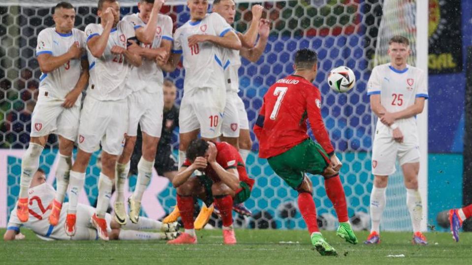 Cristiano Ronaldo takes a free kick against the Czech Republic