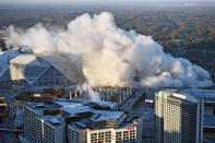 <p>The Georgia Dome is destroyed in a scheduled implosion Monday, Nov. 20, 2017, in Atlanta. The dome was not only the former home of the Atlanta Falcons but also the site of two Super Bowls, 1996 Olympics Games events and NCAA basketball tournaments among other major events. (AP Photo/Mike Stewart) </p>