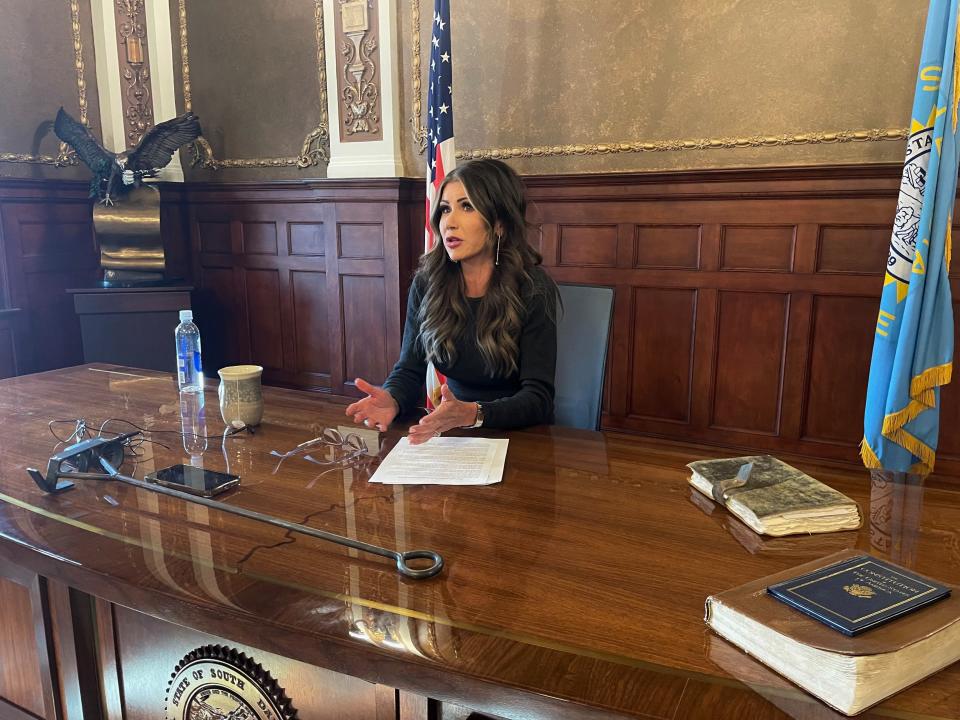 Gov. Kristi Noem talks to reporters about the proposal to cut the overall sales and use tax on groceries in Pierre on Monday, March 6.