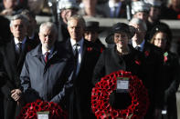 FILE - In this Sunday, Nov. 11, 2018 file photo, Britain's Prime Minister Theresa May, front right, and Labour Party leader Jeremy Corbyn, front left, attend the Remembrance Sunday ceremony at the Cenotaph in London. May and Corbyn have met to discuss ways to break the Brexit logjam. Their negotiating teams met again Thursday, April 4, 2019. (AP Photo/Alastair Grant/File)