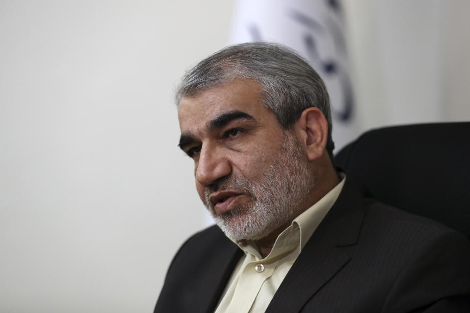 In this Nov. 9, 2019, photo, Abbas Ali Kadkhodaei, a prominent member of Iran's powerful Guardian Council, speaks in an interview with The Associated Press, in Tehran, Iran. A prominent member of Iran’s powerful Guardian Council has told The Associated Press that the Islamic Republic should stop honoring the terms of its collapsing 2015 nuclear deal with world powers amid tensions with the U.S. (AP Photo/Vahid Salemi)