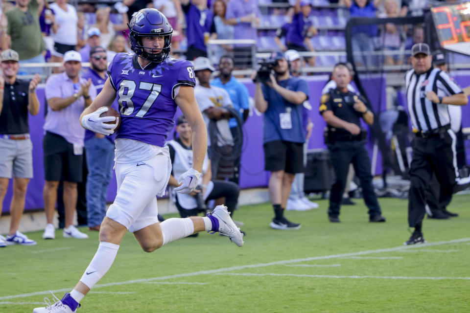 TCU wide receiver Bake Nowell returns a blocked Nicholls State punt for a touchdown during the first half of an NCAA college football game Saturday, Sept. 9, 2023, in Fort Worth, Texas. (AP Photo/Gareth Patterson)