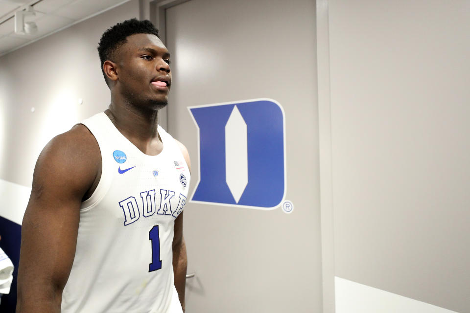 Duke's Zion Williamson reacts in the locker room after his team's 68-67 loss to Michigan State in the East regional game of the 2019 NCAA tournament. (Patrick Smith/Getty Images)