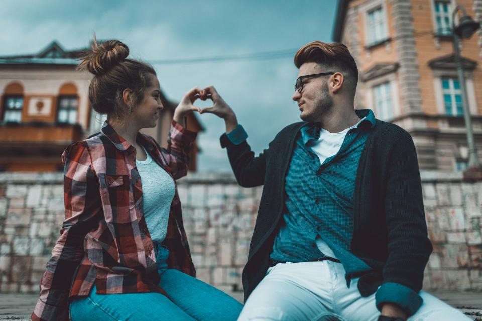 charming young couple enjoying a day in the city and having fun