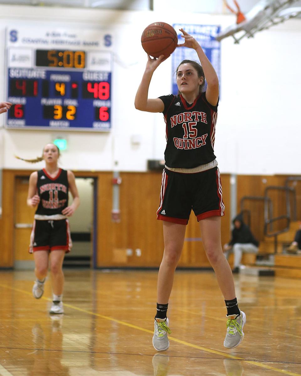 North Quincy's Ava Bryan rises up for a three pointer to give North Quincy the 51-41 lead over Scituate during fourth quarter action of their game against Scituate at Scituate High on Tuesday, Dec. 20, 2022. 