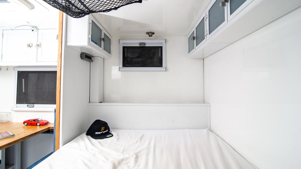 The 1987 Mercedes-Benz Unimog U1300L camper conversion's sleeping area