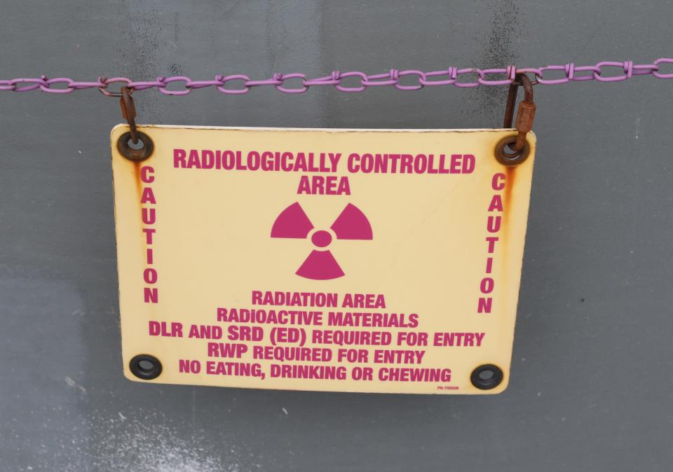 A Radiologically Controlled Area sign is pictured at the spent fuel storage casks at the Indian Point Energy Center in Buchanan March 28, 2023. The site is undergoing decommissioning by Holtec Decommissioning International. 
