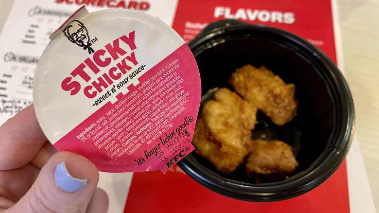 A cup of KFC's Sticky Chicky Sweet 'n Sour Sauce