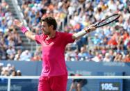 Stan Wawrinka of Switzerland gestures to the crowd after winning a point in his match against Illya Marchenko of Ukraine on day eight of the 2016 U.S. Open tennis tournament at USTA Billie Jean King National Tennis Center. Mandatory Credit: Jerry Lai-USA TODAY Sports