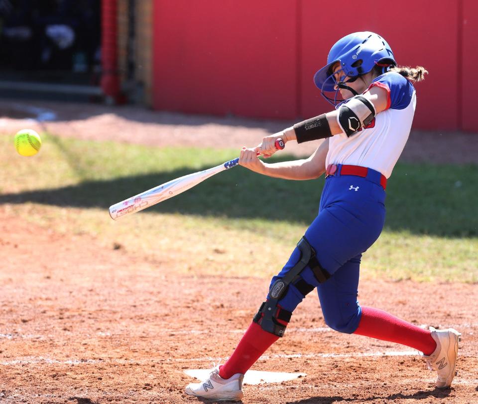Lillian Bucher of Tuslaw doubles and drives in a run during their DIII state semifinal game against Miami East at Firestone Stadium on Friday, June 3, 2022.