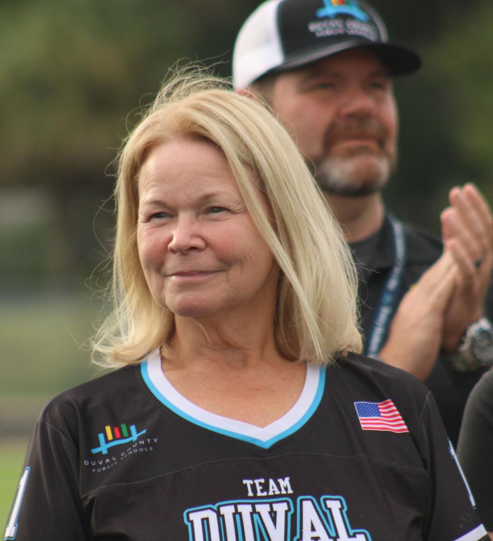 Duval Countyschools Superintendent Dana Kriznar is shown here in Septmber with chief of schools Scott Schneider at an event ceebrating Englewood High School's artificial turf field.