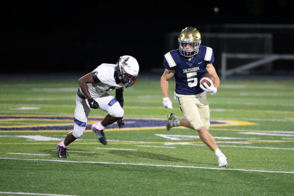 Salesianum's Lukas Ryan returns a punt in last week's 44-21 win over DMA. Brad Myers and Matt Kalin believe the Sals will move to 2-0 this week, while Kevin Tresolini is picking Bonner and Prendergast to defeat Sallies.