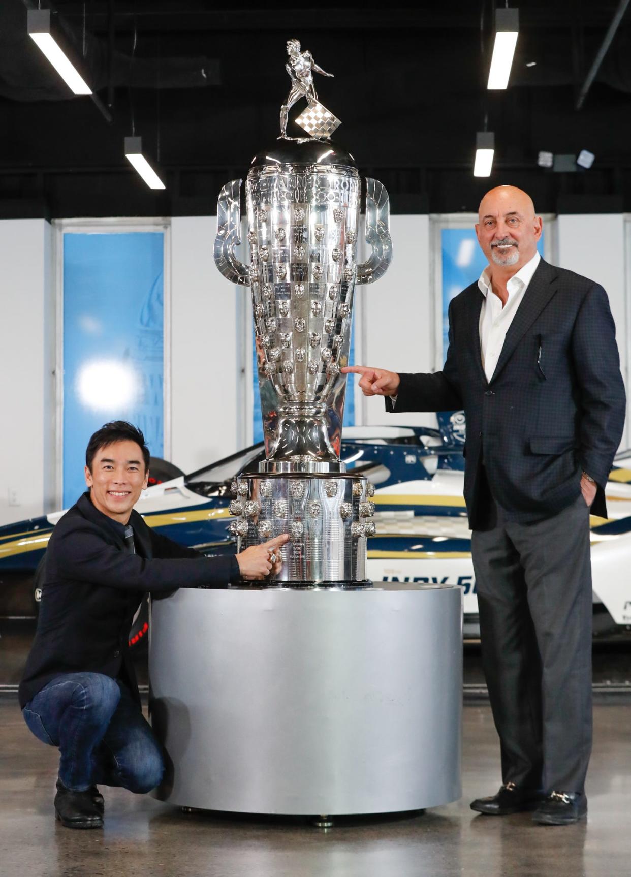 Two time Indy 500 winner, Takuma Sato (left) and Rahal Letterman Lanigan team owner and fellow Indy 500 winner Bobby Rahal are photographed with the Borg-Warner Trophy on Friday, February 19, 2021 at the Indianapolis Motor Speedway Museum. The trophy now features Sato's face twice. 