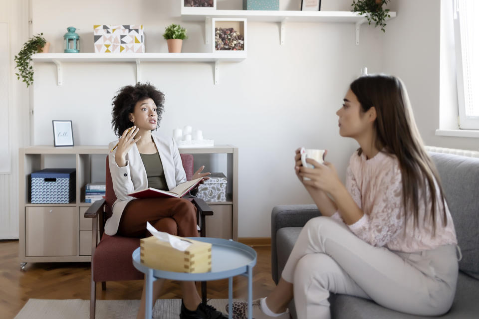 Woman talking with her therapist