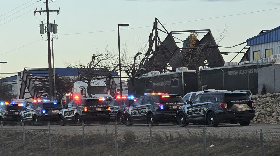 Authorities respond to the scene of a reported building collapse near the Boise Airport on Wednesday, Jan. 31, 2024, in Boise, Idaho. (Terra Furman via AP)