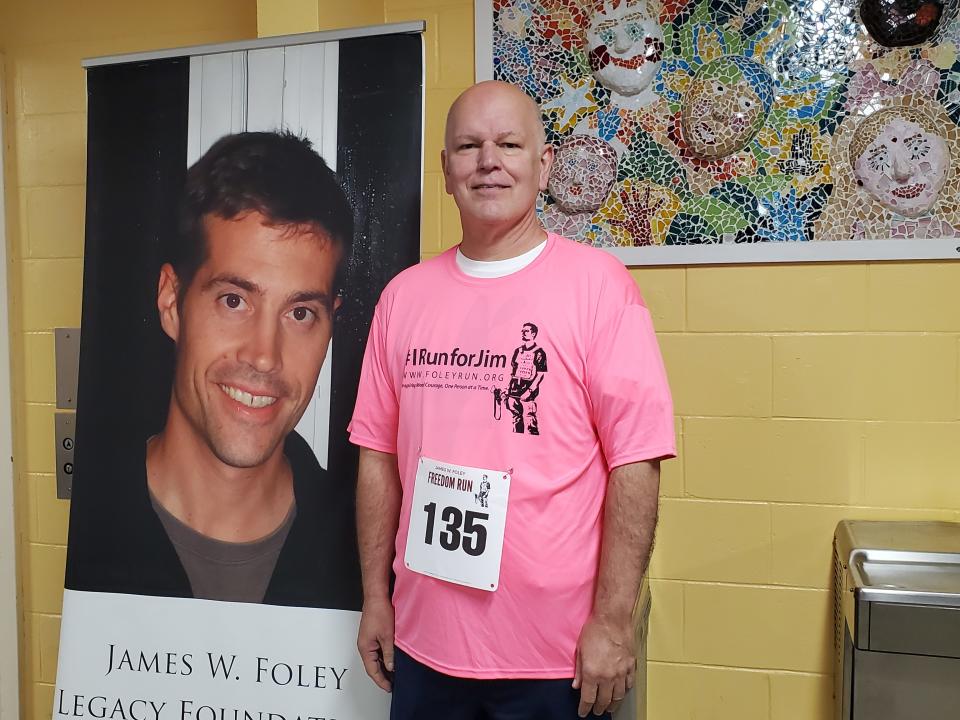 Dennis Fitzpatrick, assistant U.S. attorney in Virginia's Eastern District, was one of the prosecutors responsible for the convictions in James Foley's murder. He is seen prior to running in the eighth annual James Foley Freedom Run in Rochester Saturday, Oct. 15, 2022.