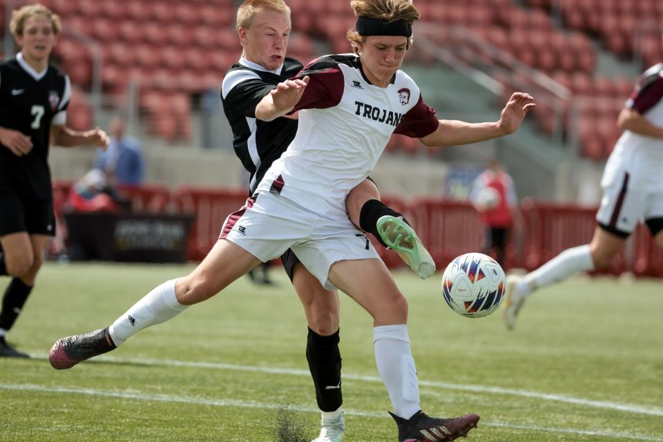 Ogden’s Harrison Hoskins and Morgan’s Garrett Grow compete for the ball in a 3A boys soccer state semifinal at Zions Bank Stadium in Herriman on Wednesday, May 10, 2023. | Spenser Heaps, Deseret News