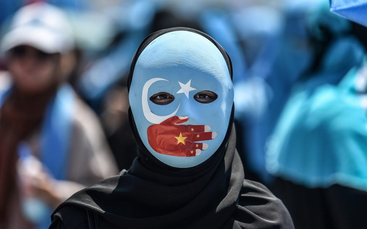 Muslim states have been deeply divided over how to respond to China's policy - AFP