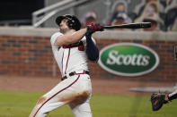Atlanta Braves' Adam Duvall (23) hits a home run in the fifth inning of a baseball game against the Miami Marlins on Wednesday, Sept. 9, 2020, in Atlanta. (AP Photo/Brynn Anderson)