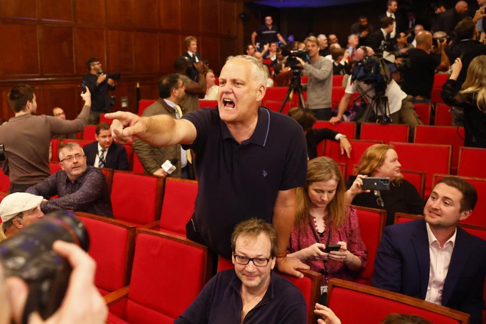 Wild scenes at Farage’s press conference after his party took five seats (EPA)