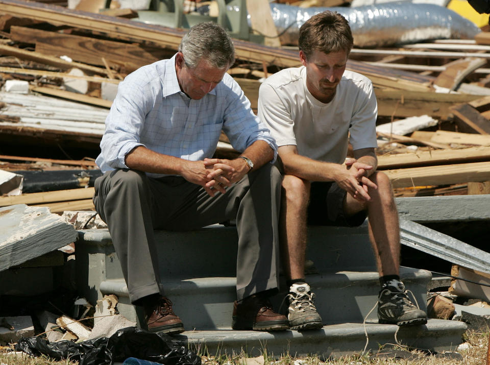 George Bush sitting with Biloxi resident Patrick Wright, whose home was destroyed during Hurricane Katrina in 2005.&nbsp; (Photo: Win McNamee via Getty Images)