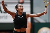Canada's Leylah Fernandez celebrates winning her fourth round match against Amanda Anisimova of the U.S. in three sets 6-3, 4-6, 6-3, at the French Open tennis tournament in Roland Garros stadium in Paris, France, Sunday, May 29, 2022. (AP Photo/Thibault Camus)